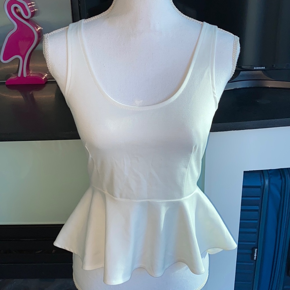 NWOT Foreign Exchange Peplum Tank